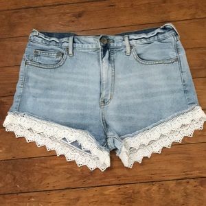 Free People denim shorts with lace trim